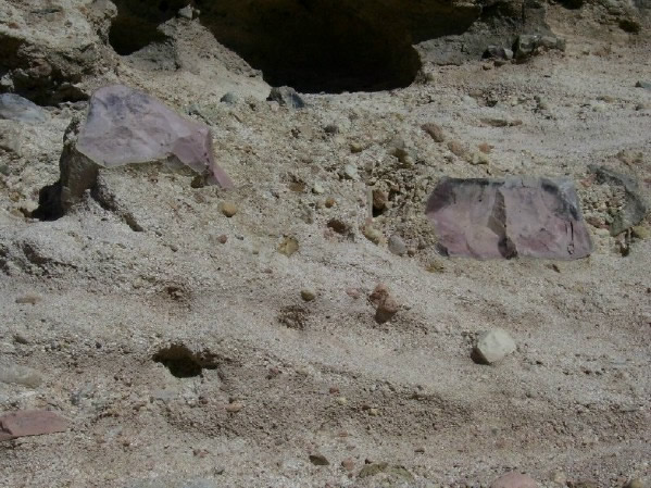 Purple blocks of rhyolite at the base of Castle Rock